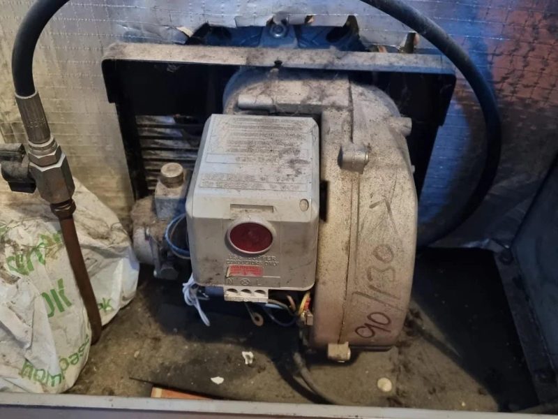 Oil boiler lifespan showing an old oil boiler in Norfolk